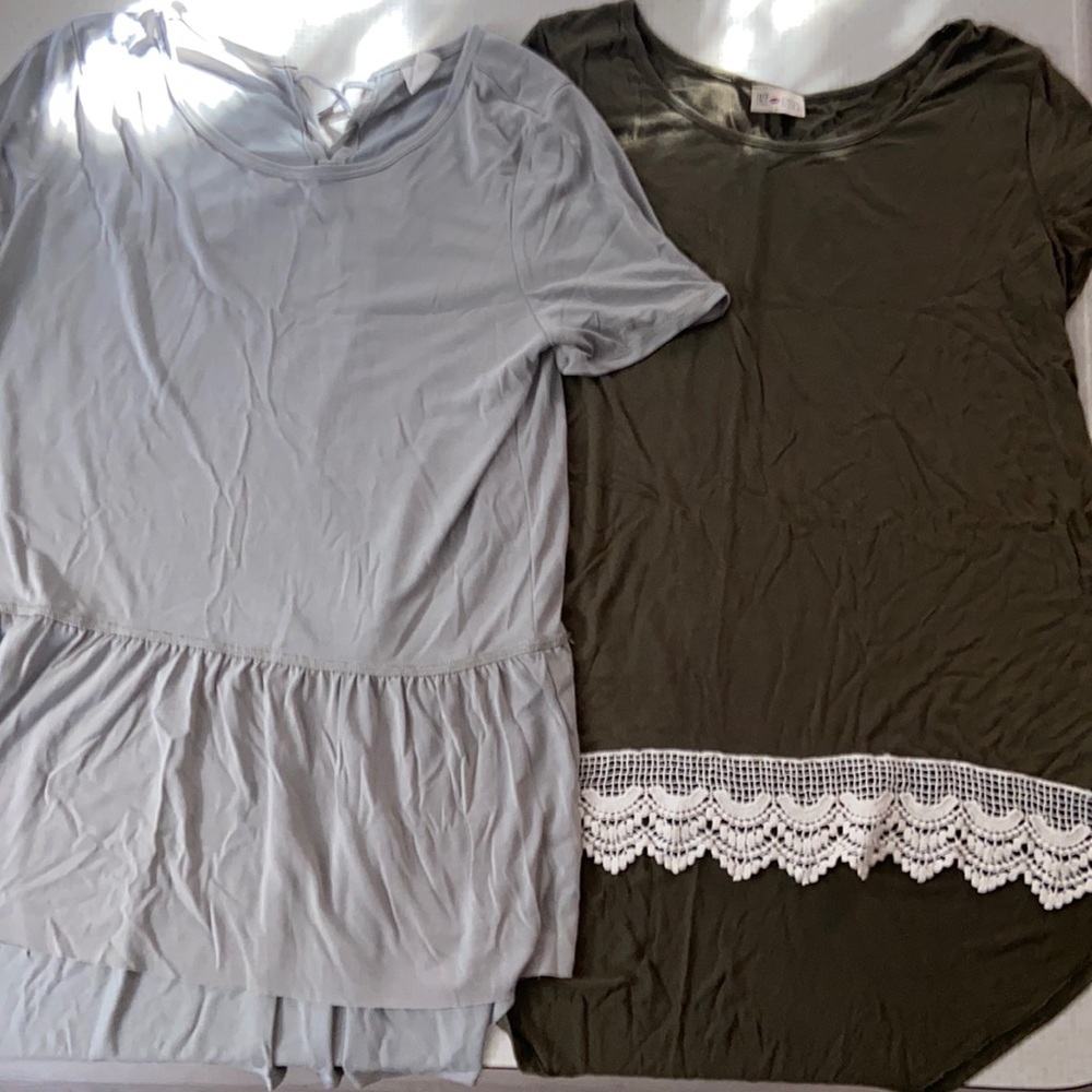 Large shirts. Shorter in front longer in back